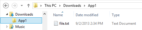 The Downloads folder shows a subfolder matching the app’s name due to the Desktop.ini file placed in the subfolder.
