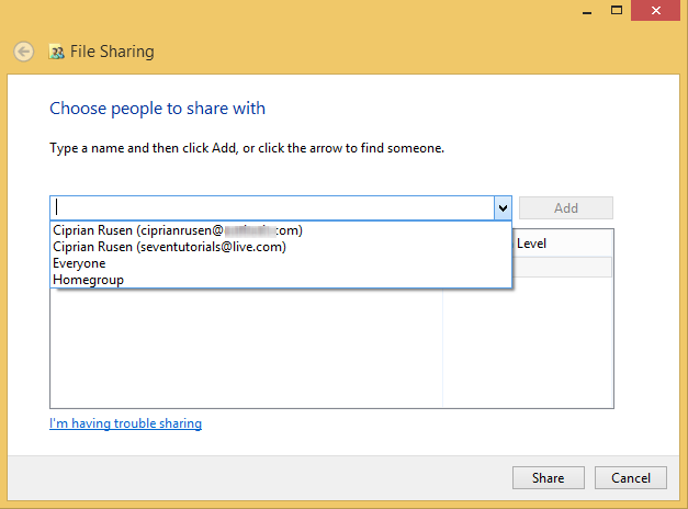 A screen shot of the File Sharing Wizard with a dropdown menu of user accounts you can share with.