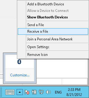 Click the Bluetooth icon and then select Receive A File.