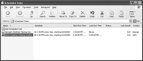 The Scheduled Tasks window shows a list of tasks for your machine and provides statistics about them.