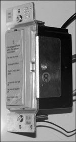 A programmable X10 dimmer switch that must be configured with a Maxi Controller or with a computer interface.