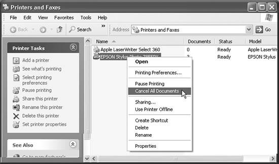 At first, the task pane in the Printers and Faxes window offers only two commands. But when you click a printer icon, a long list of useful options appears, as shown here. Many of them duplicate the options that appear when you right-click a printer icon—something you’d be wise to remember the day your right mouse button breaks.