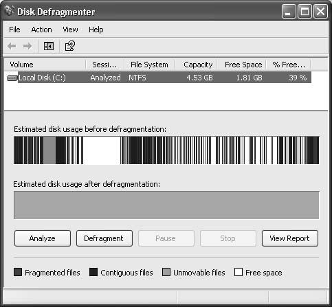 A detailed view of the defragmentation process helps you understand what Disk Defragmenter is doing. The color of each little square shows what’s going on, as the program juggles software files, system files, and data files to put each file in the best possible place. At that point of perfection, Disk Defragmenter announces victory over fragmentation and asks if you want to close the program. Say Yes unless you have another hard drive that needs defragging.