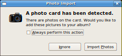 GNOME detects the presence of a digital camera and asks whether the photos should be imported.