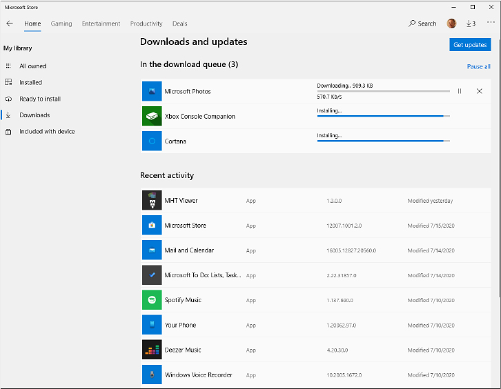 This screen shot shows the Downloads And Updates page in Microsoft Store, with three apps in the download queue and a long list of additional apps beneath the Recent Activity heading.