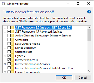 This screenshot shows the Windows Features dialog box, with the heading Turn Windows Features On Or Off and a list of features and programs, each with a check box that can be selected or cleared.
