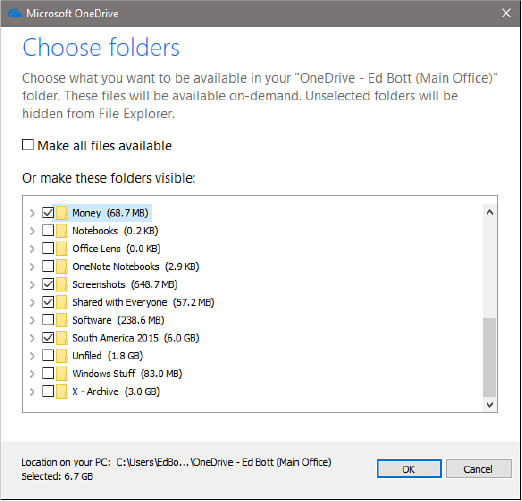This screenshot shows the Choose Folders dialog box for OneDrive. In the center is a check box labeled Make All Files Available. Below that is a list of 11 folders under the heading Or Make These Folders Visible, with four of those folders selected.
