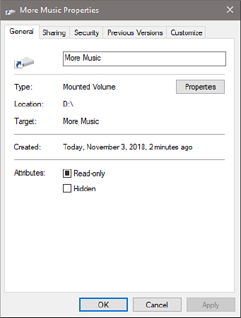 This screenshot shows the Properties dialog box for a newly created mounted volume called More Music. The Type field in the properties dialog box says Mounted Volume. A Properties button appears to the right of the Type field.