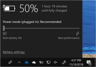 This screenshot shows the battery flyout above the battery icon in the notification area. It shows the remaining battery life as 50 percent, with an estimate of time till charging is complete. A slider control with Best Battery Life on the left and Best Performance on the right is below those details. 