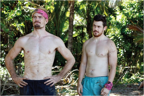Image of two contestants of the sixth season of Australian Survivor, who are standing and facing the front (both are topless).