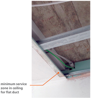 Figure 4.19 Concrete soffit with suspended ceiling zone for services and layer of mineral wool. A deeper ceiling zone with space for circular duct will improve performance of ventilation system.