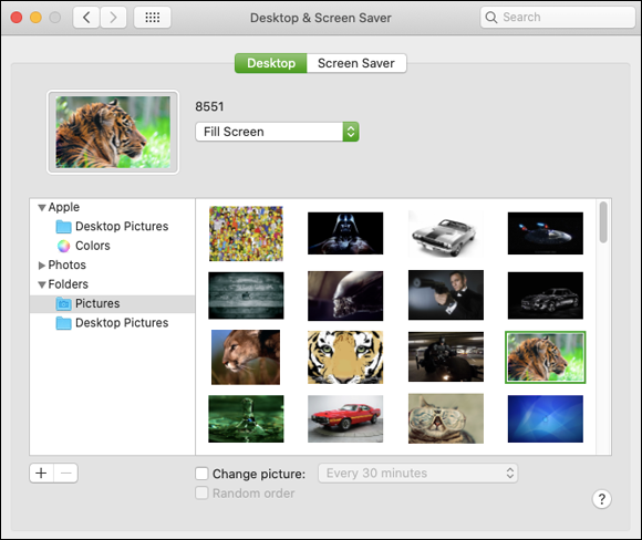 Screenshot of Desktop & Screen Saver pane displaying images from Pictures folder.