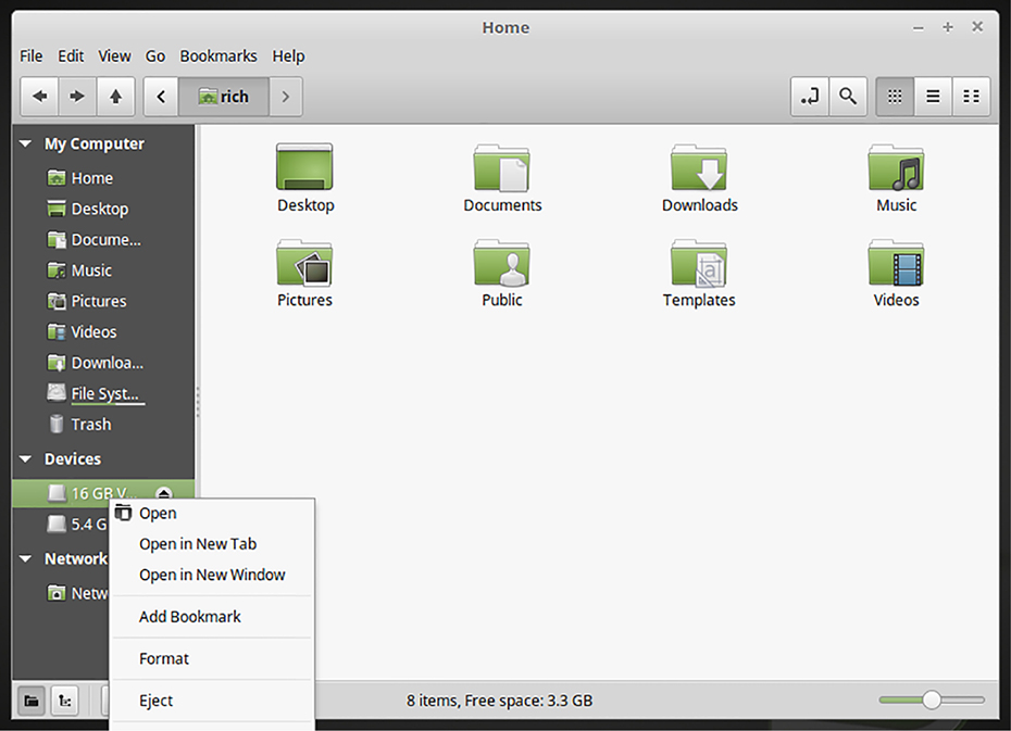 The figure shows a screenshot illustrating how Linux file managers enable you to unmount removable media.