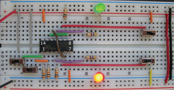 Using the 74HC00 to demonstrate both a single NAND gate and an OR gate consisting of three NAND gates. (Labels for the four corner pins have been added.)
