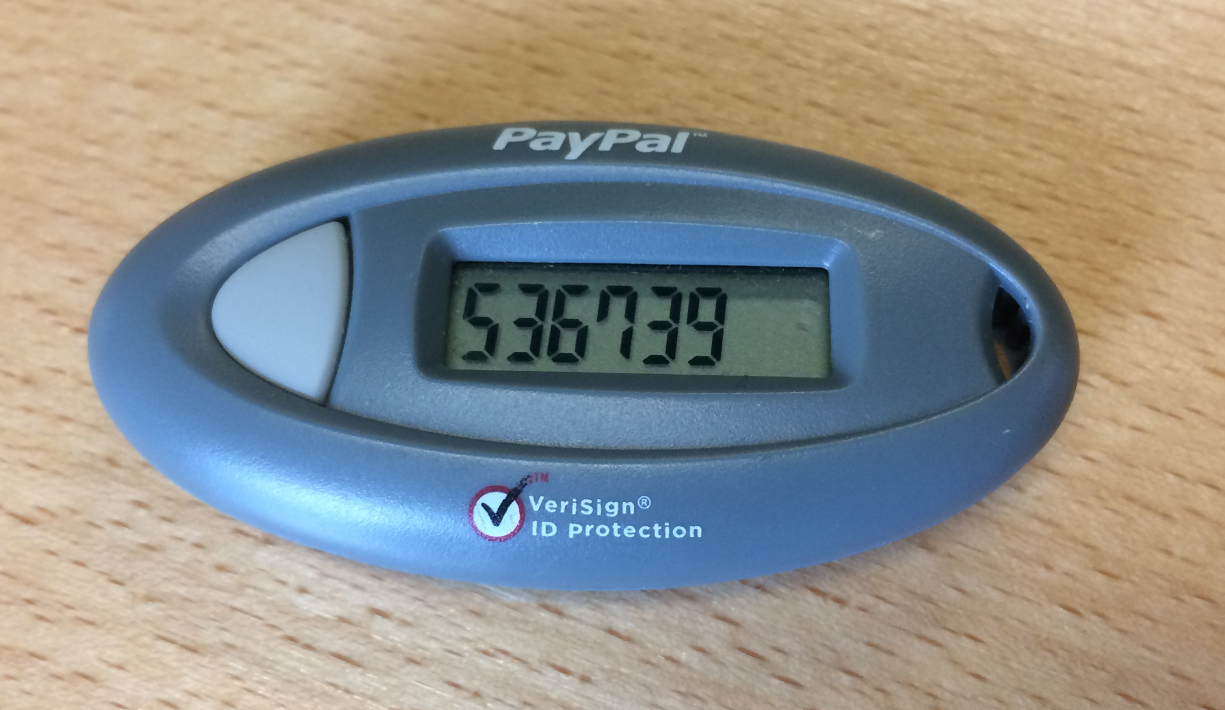 Photo depicts a device showing the security token for a PayPal account.