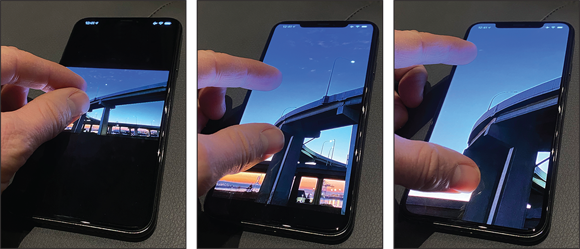 Photos depict initiating the pinch-to-zoom technique using the thumb and forefinger.