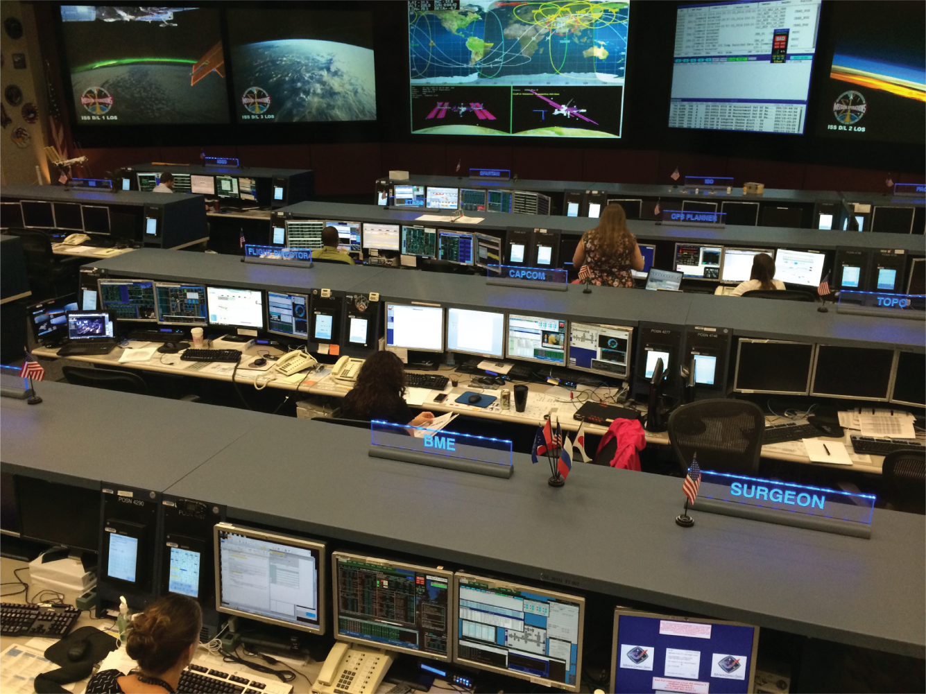 Photo depicts the Monitors at Mission Control Center for the International Space Station.