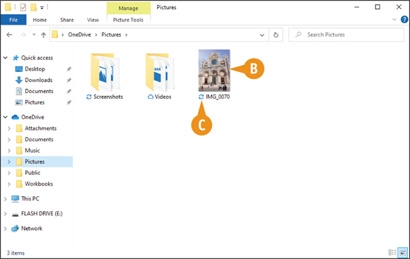 Snapshot of the OneDrive page with the moved file and the Syncing icon is indicated.