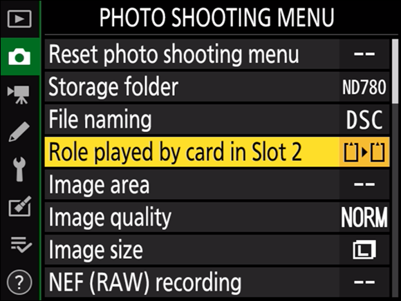 Illustration of the Photo Shooting Menu highlighting the Role Played by Card in Slot 2 option on the multi selector.