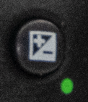 Image of the exposure compensation button to rotate the dial clockwise to decrease exposure or counterclockwise
to increase exposure.