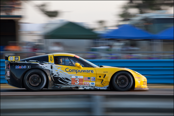 Photograph of a race car clicked in the middle of a racing event, when the participants slowed down a bit.