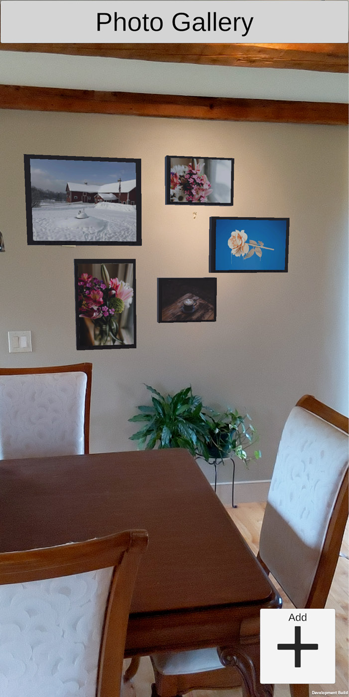 Figure 7.7 – Virtual framed photos arranged on my dining room wall
