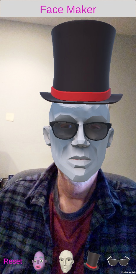 Figure 9.7 – Selfie with me wearing a top hat, sunglasses, and faceted face at the same time
