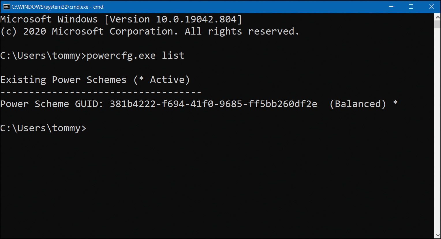 This screenshot shows a Command Prompt window running powercfg.exe. The executable has been ran and the information of Active, Balanced and the Power Scheme GUID (which is a 32 digit hexadecimal number) is shown.