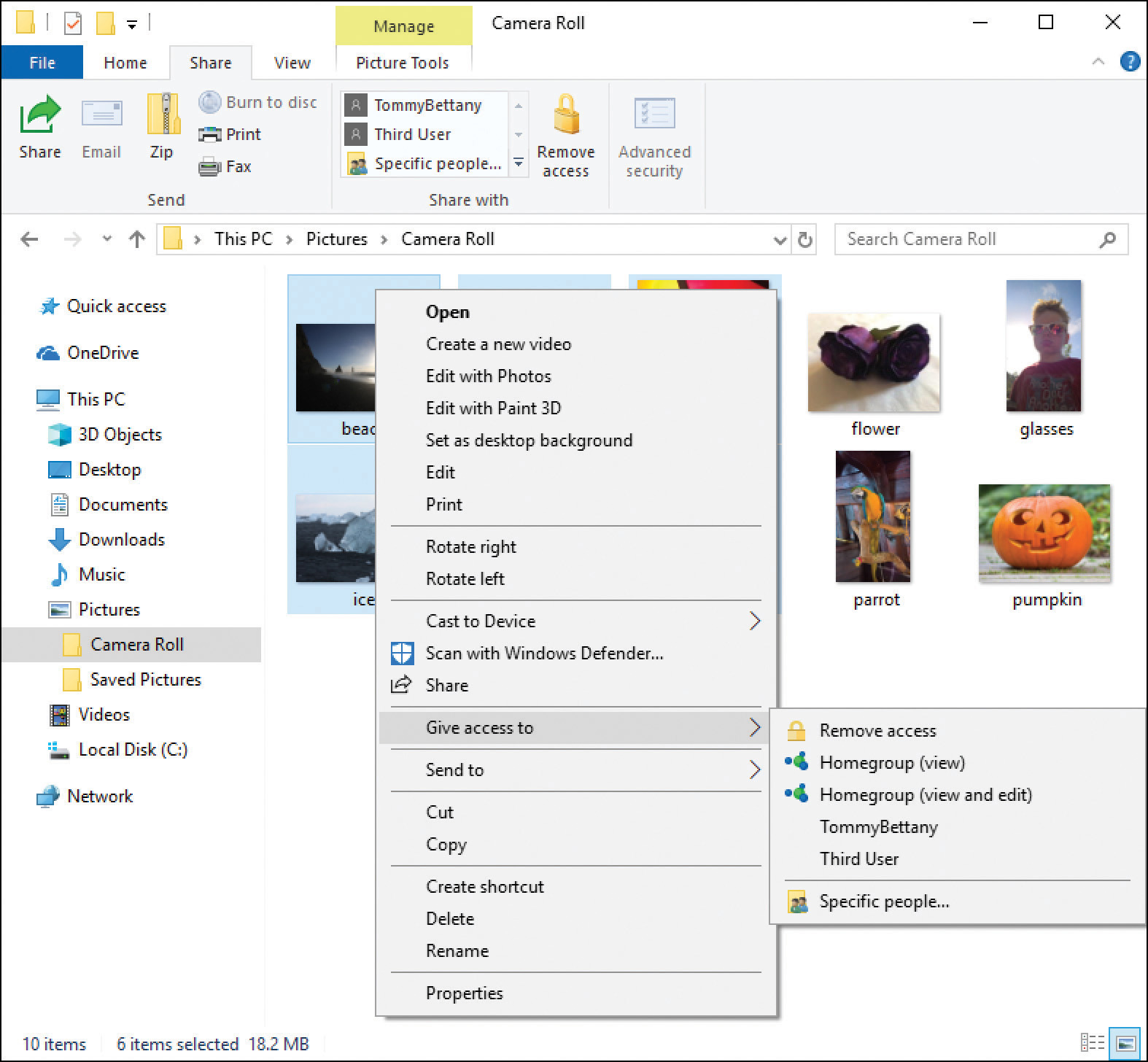 A screenshot shows the File Explorer with the Camera Roll folder selected and several photographs selected. The context menu is shown in the foreground with Give Access To selected, with the options Remove Access, Homegroup (View), Homegroup (View And Edit), TommyBettany, Third User, and Specific People.