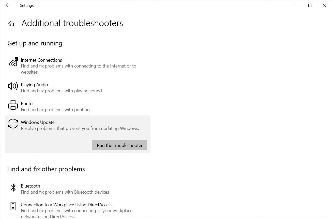 A screenshot shows the Troubleshoot tab in Update & Security within the Settings app. The administrator has selected Windows Update, and the Run The Troubleshooter button is now visible.  