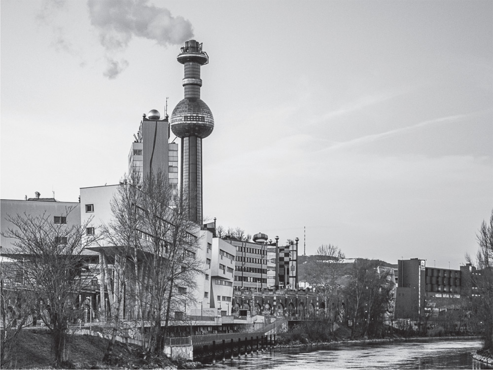 Photo depicts the Spittelau Waste Incineration CHP plant in Vienna, on the Danube River.