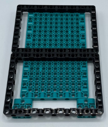Figure 6.7 – Stack the open frame on the teal base plate
