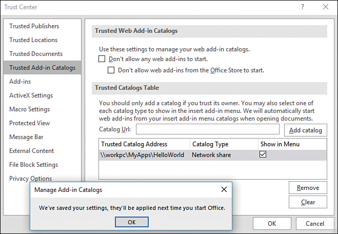 The figure shows the Trusted Add-In Catalogs page of the Trust Center. The path to the HelloWorld folder has been added to the Trusted Catalogs Table. Also shown is the message box confirming the addition and informing the user Excel must be restarted for the change to be applied.