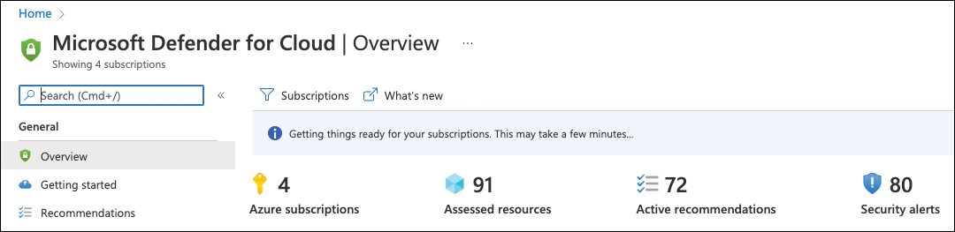 This is a screenshot showing Microsoft Defender for Cloud's overview with four Azure subscriptions, 91 assessed resources, 72 active recommendations, and 80 active security alerts. Above these numbers, an information bar reads, “Getting things reads for your subscriptions. This may take a few minutes.” This information appears when the automated process is running in the back-end to register the resource provider, assign the Azure security benchmark and possibly create one or more default Log Analytics workspaces.