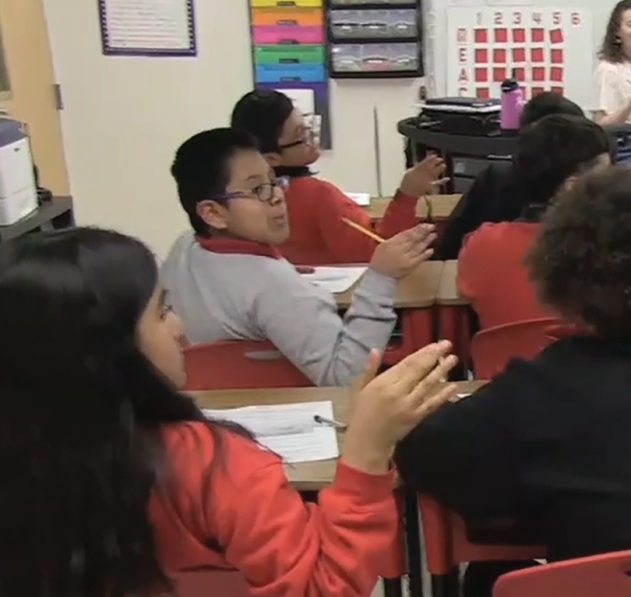 Photograph of students in the classroom.