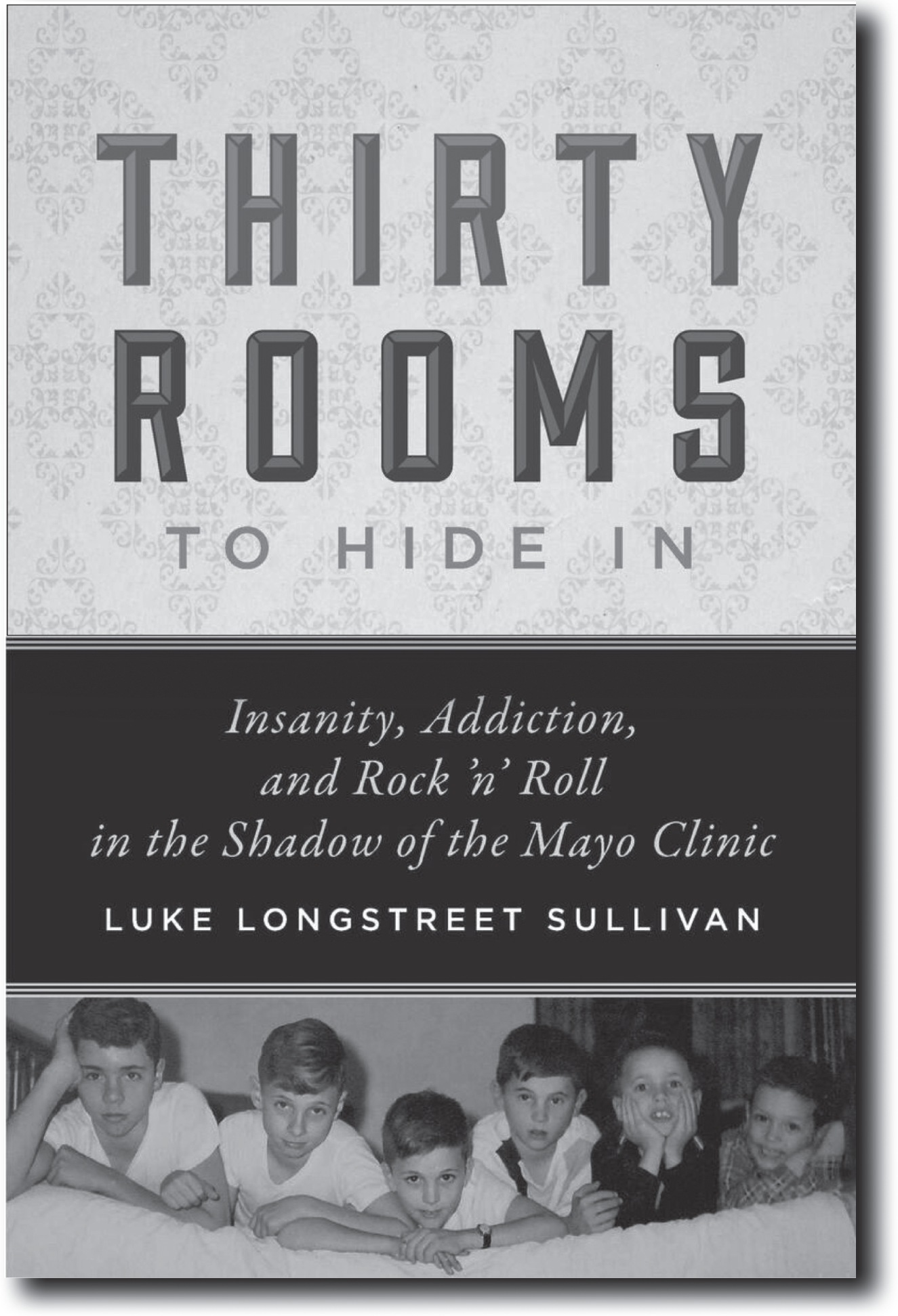 An illustration of the front page showing, Thirty Rooms to Hide In: Insanity, Addiction, and Rock ’n’ Roll in the Shadow of the Mayo Clinic.