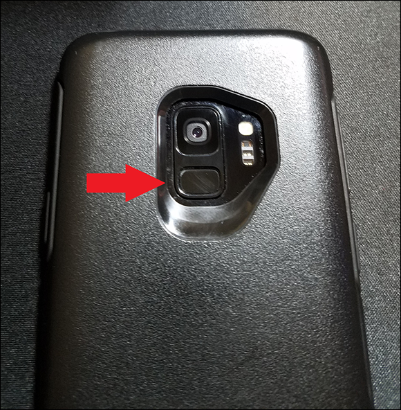 Photo depicts a phone fingerprint sensor on a Samsung Galaxy S9 in an Otterbox case.