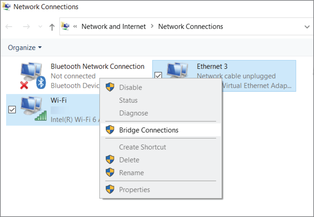 Snapshot shows a Windows laptop showing the option for a user to bridge interfaces