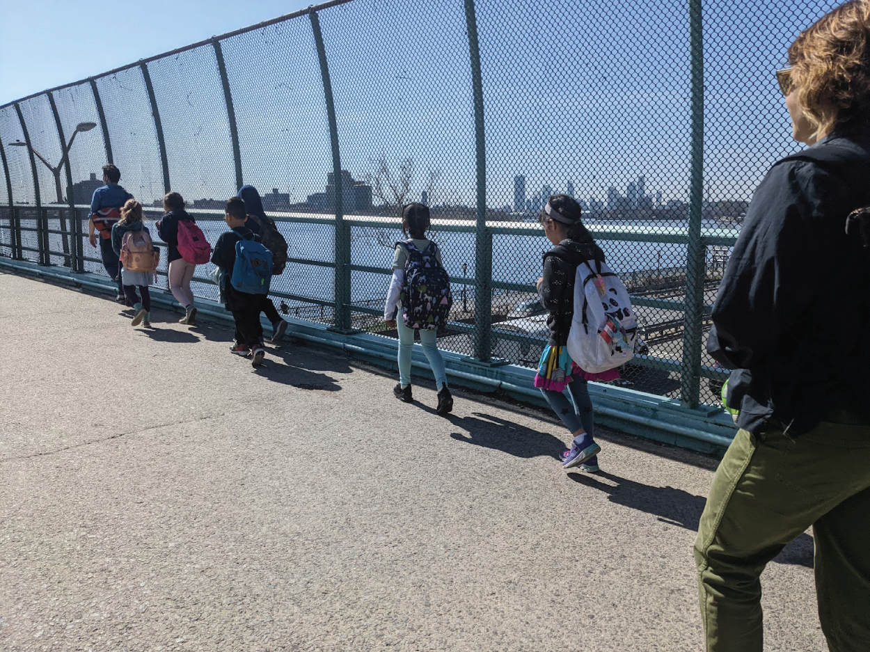 Photo depicts bridge walk: Students exploring their neighborhood
in Brooklyn, New York