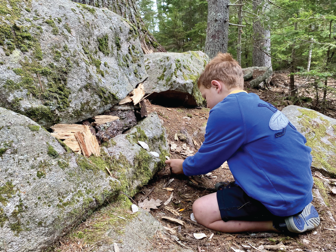 Photo depicts students love to build miniature houses and write about who lives there.