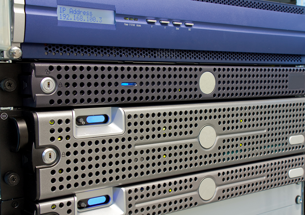 A photo shows blade servers piled up one above the other.