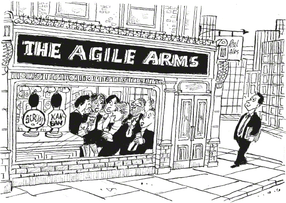 A man, dressed in suit, walks towards a bar named 'The Agile Arms'. A crowd of men and women dressed in suits are seen interacting inside. Two dispensers labelled 'SCRUM' and 'XANBAN' are placed on the table counter. 