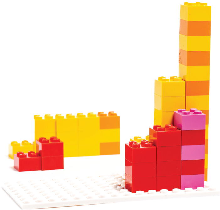 LEGO bricks on a baseplate as in Figure 6-1. The first two columns of each wall have been set aside. 3 bricks in total have been removed from the red wall, and so each of the remaining columns in the yellow wall has been shortened by three. The removed bricks are shown in the background.