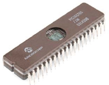 Photo depicts the Microcontroller with integrated EPROM seen through the package's quartz window. 