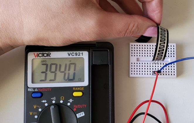 Figure 4.10 – Multimeter readings of the sensor flexed 
