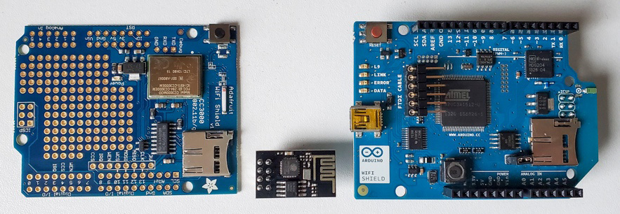 Figure 7.3 – Wi-Fi shields and the ESP8266 (the small one in the center)
