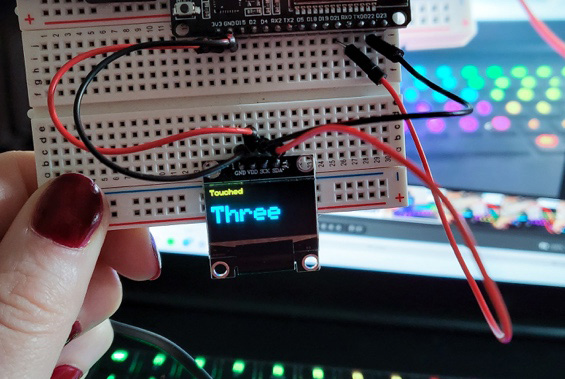 Figure 7.18 – OLED and ESP32 connected with the touch code
