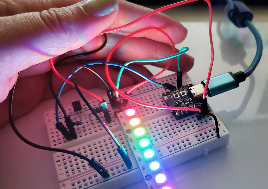 Figure 9.9 – Adding our NeoPixels to the QT Py ESP32-S2
