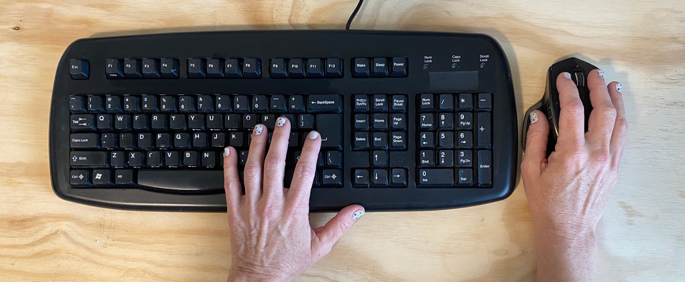 Figure 7.9 – A dominant right hand on the mouse and a left hand on the right side of the keyboard
