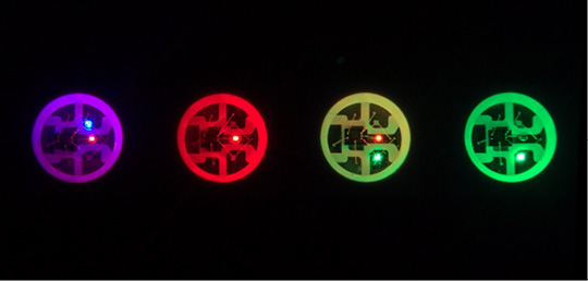 Figure 11.2 – NeoPixel LEDs glowing in different colors (courtesy: 
https://commons.wikimedia.org/wiki/File:WS2812Closeup2.jpg)
